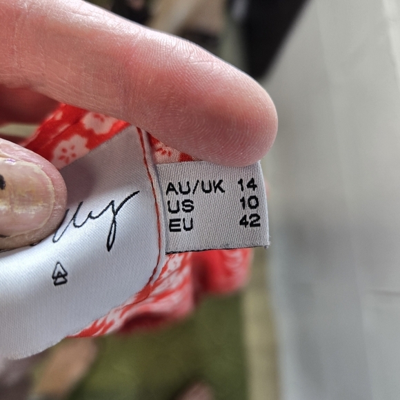 Princess Polly red white floral tie front open shorts romper - Picture 5 of 11